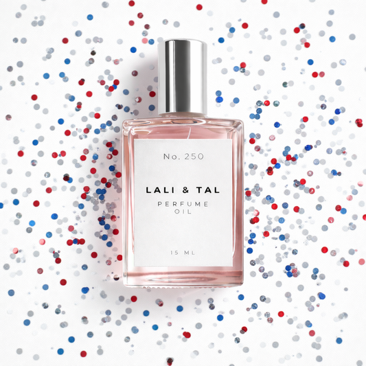 LALI & TAL No. 250 perfume oil styled with red silver and blue confetti that reflect the fragrance limited celebration for Fourth of July.