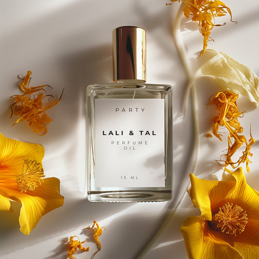 LALI & TAL PARTY perfume oil styled with ingredients that reflect the fragrance notes.
