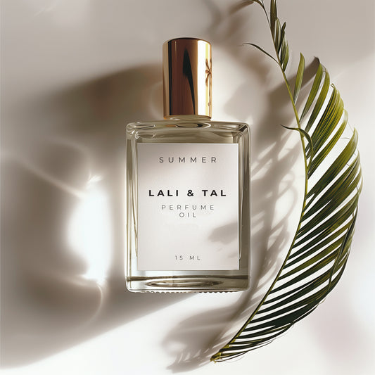 LALI & TAL SUMMER perfume oil styled with ingredients that reflect the fragrance notes.