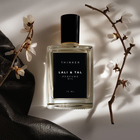 LALI & TAL THINKER perfume oil styled with ingredients that reflect the fragrance notes.