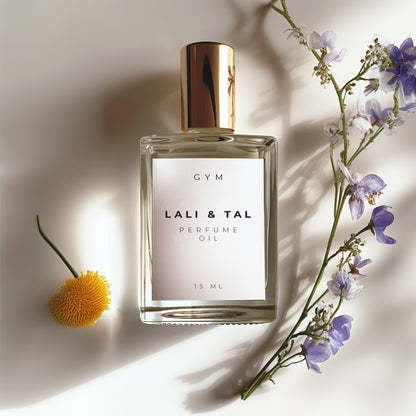 LALI & TAL GYM perfume oil styled with ingredients that reflect the fragrance notes.