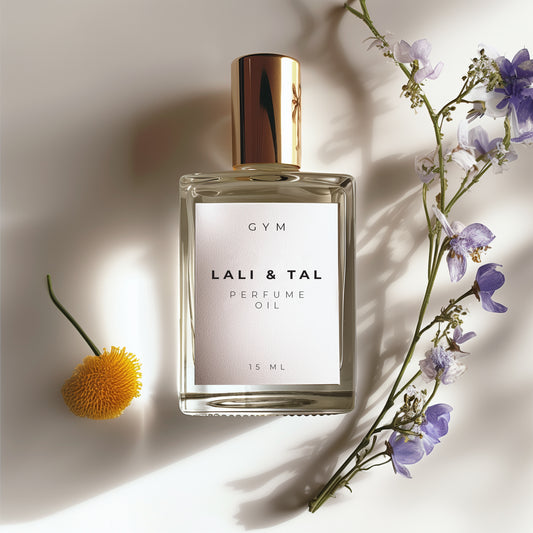 LALI & TAL GYM perfume oil styled with ingredients that reflect the fragrance notes.