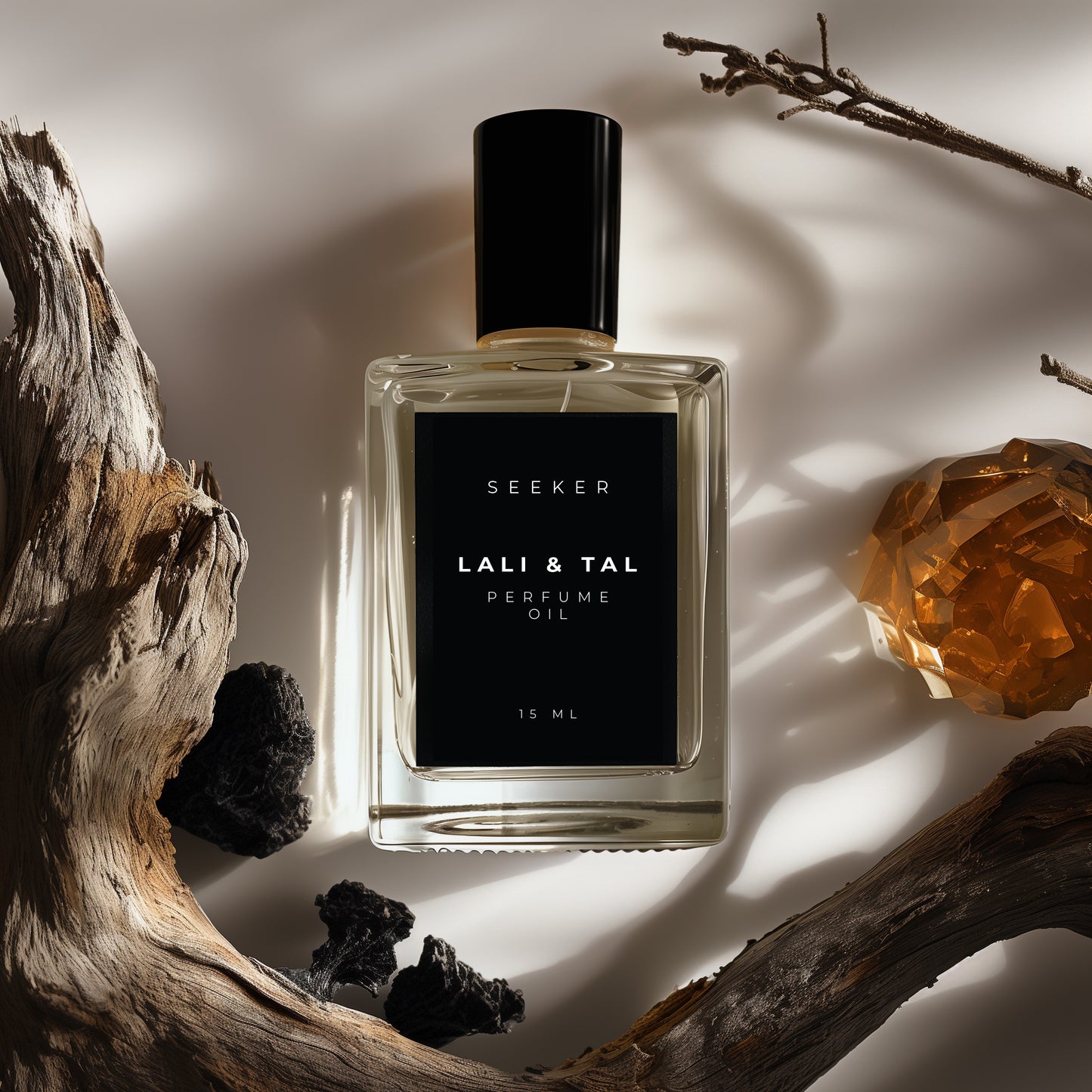 LALI & TAL SEEKER perfume oil styled with ingredients that reflect the fragrance notes.