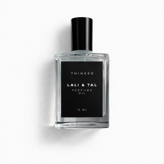 LALI & TAL THINKER perfume oil bottle photographed on a white background.