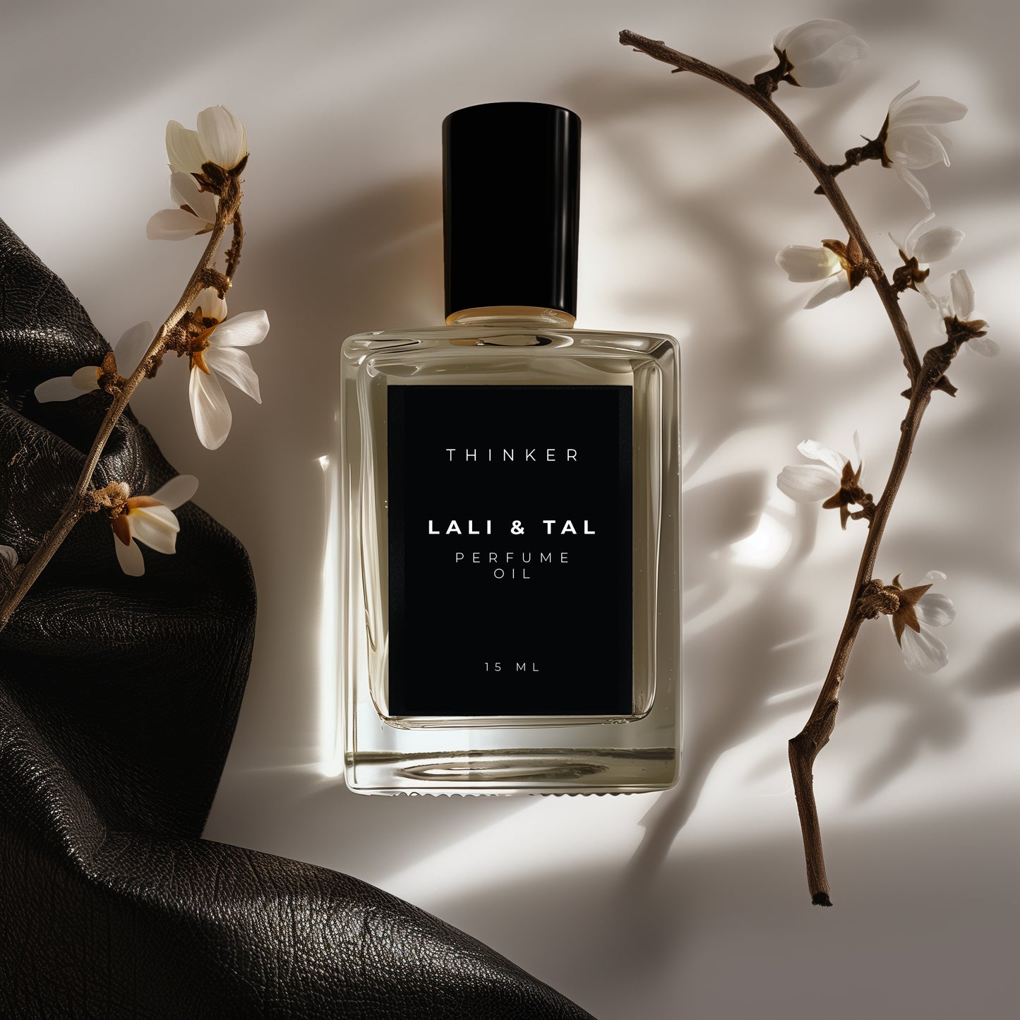 LALI & TAL THINKER perfume oil styled with ingredients that reflect the fragrance notes.